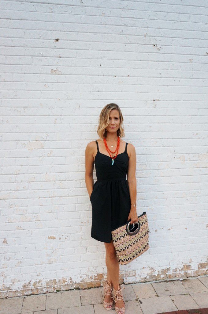 Little black dress, wrap up heels, tote, and statement jewelry