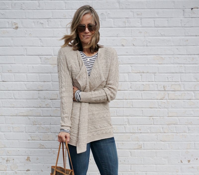 Cozy layers: striped tee, cardigan, flare pants, sunglasses, Louis Vuitton bag