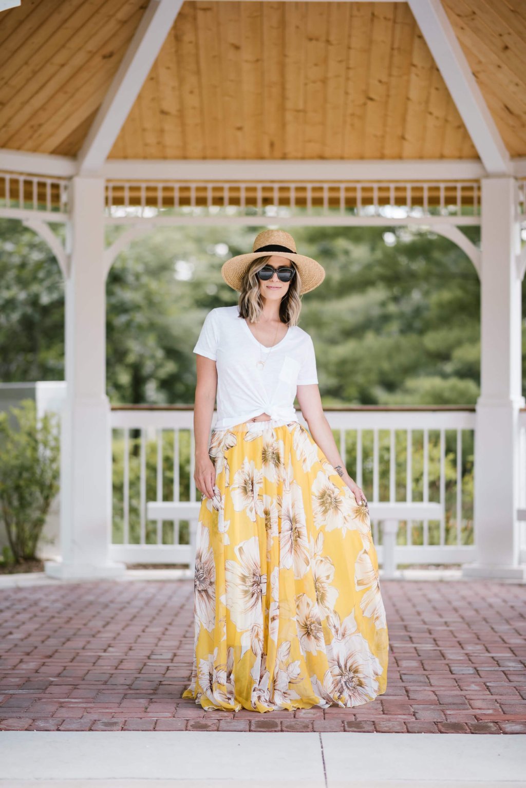 Summer style: floral maxi skirt, white tee, straw hat, sunglasses, sandals