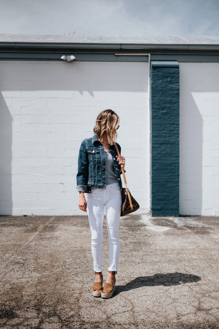White jeans, striped tank, espadrilles, denim jacket, Louis Vuitton bag, sunglasses