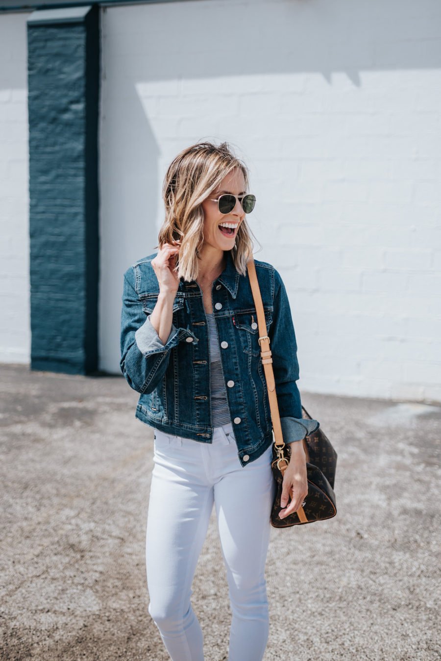 White jeans, striped tank, espadrilles, denim jacket, Louis Vuitton bag, sunglasses