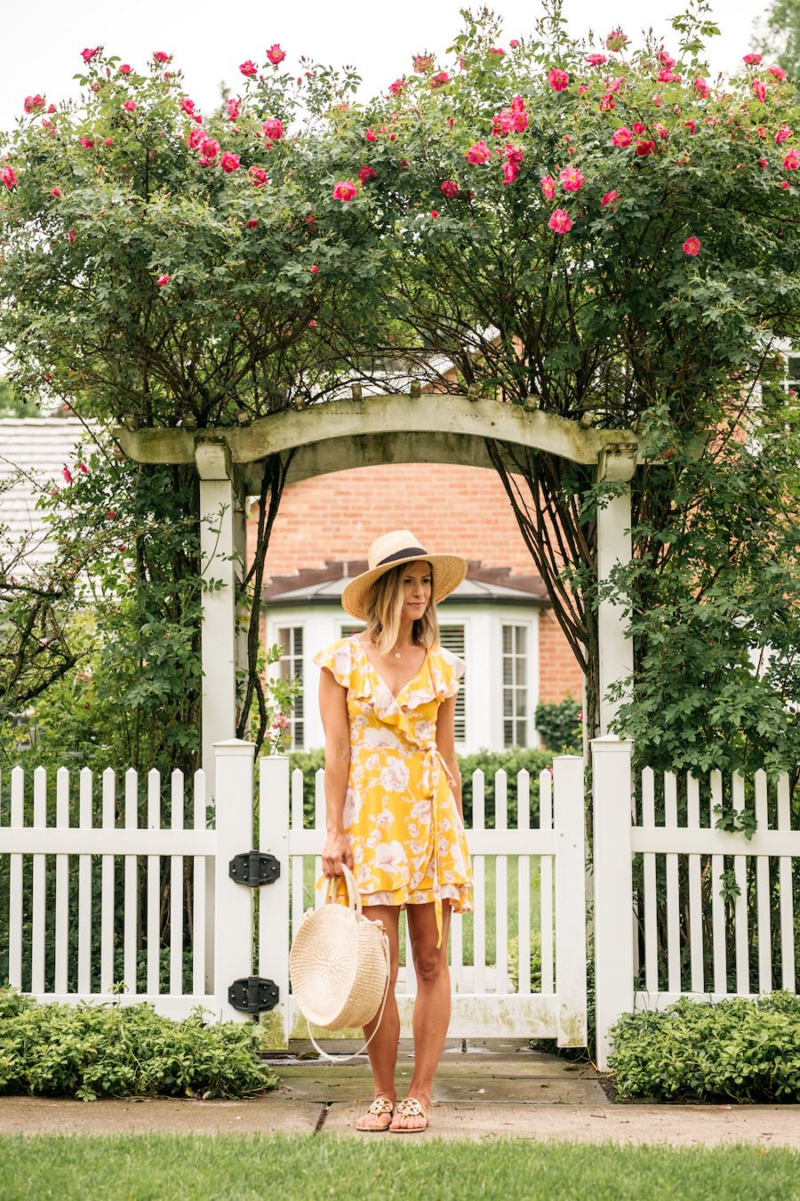 Yellow floral dress, straw bag and hat, sandals