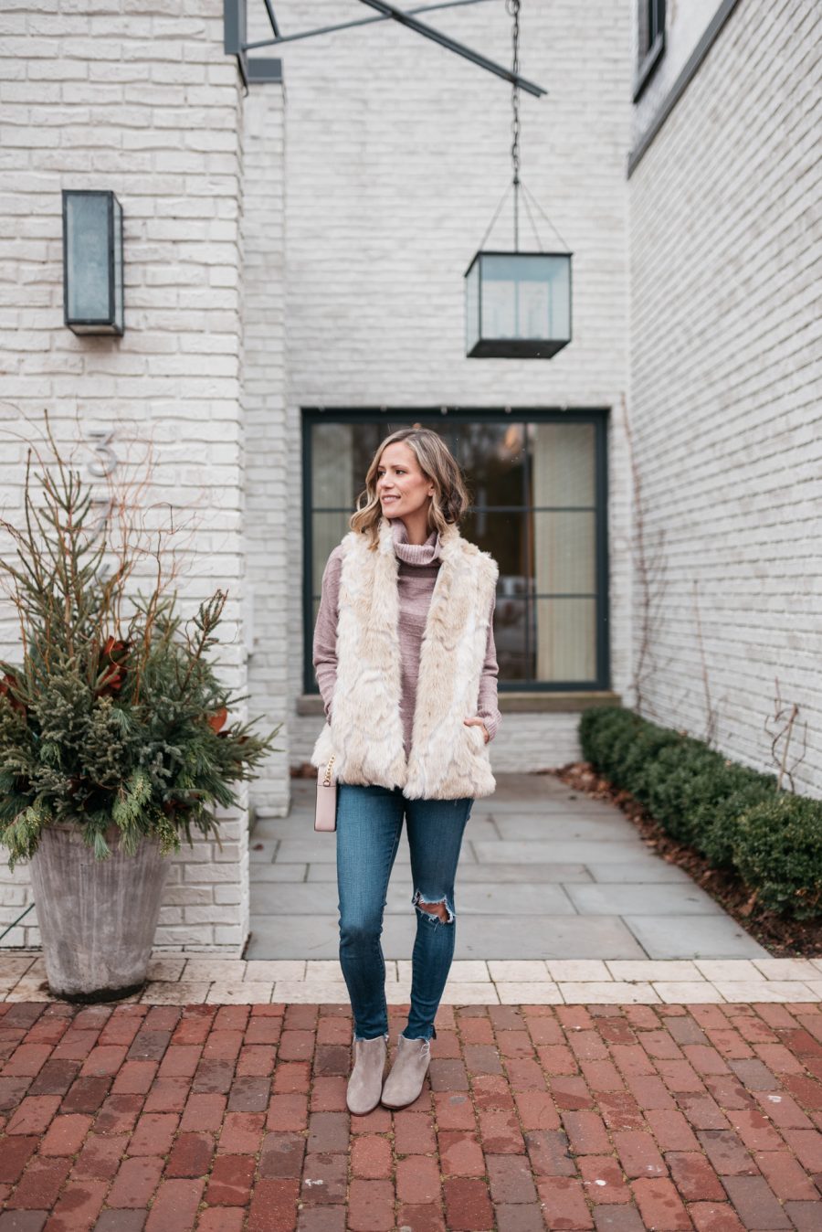 2019 blogging goals,
pink turtleneck, faux fur vest, skinny jeans, crossbody, and booties
