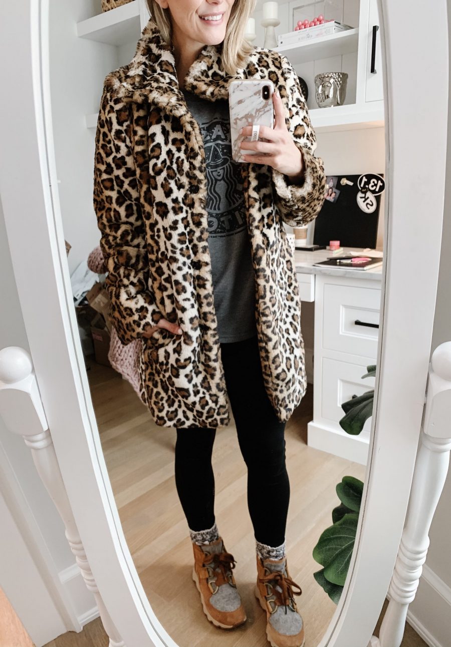 Leopard coat, graphic tee, leggings, and Sorel boots