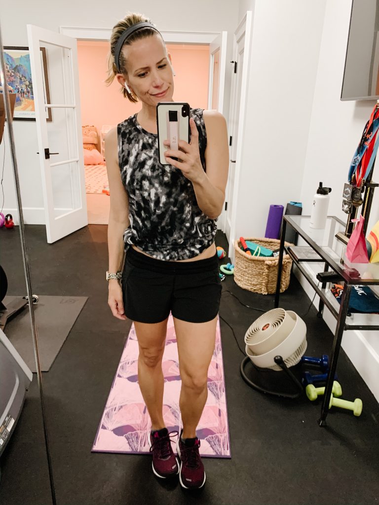 I'm sharing my postpartum fitness routine of at home workouts including Peloton, yoga, HIIT cardio, and running. 