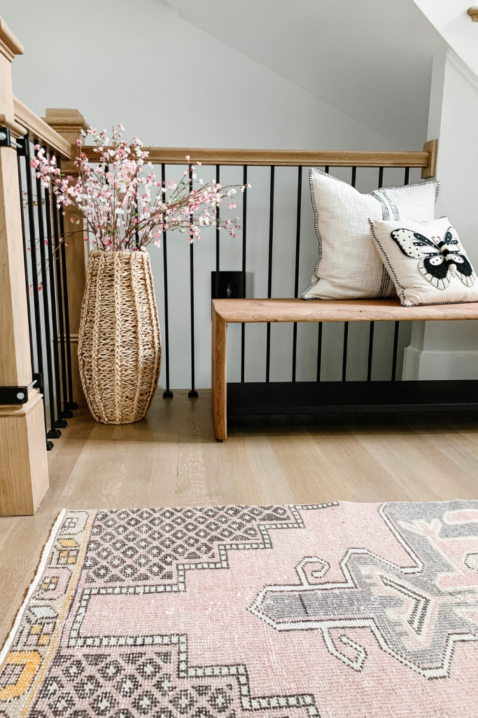 I found the most fabulous vintage rug on Etsy that compliments our entryway perfectly, I'm sharing the details along with some other decor.