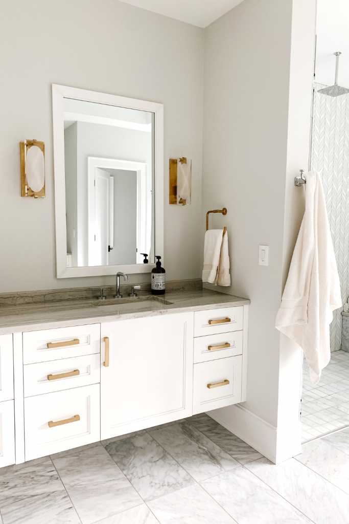 Today in the My Kind Of Sweet Home weekly series I'm sharing our Master Bathroom complete with white marble and gold accents. 