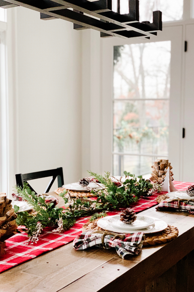 Today I'm sharing a simple holiday tablescape to spruce up your space. There's just something about a festive table, right?