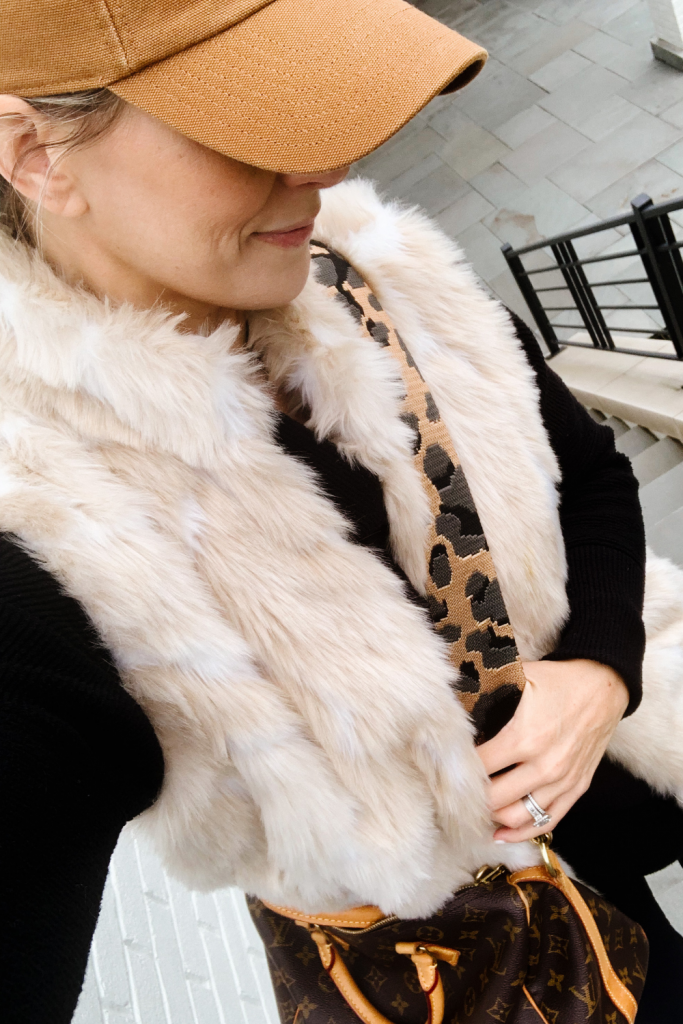 Faux fur vest and leopard bag