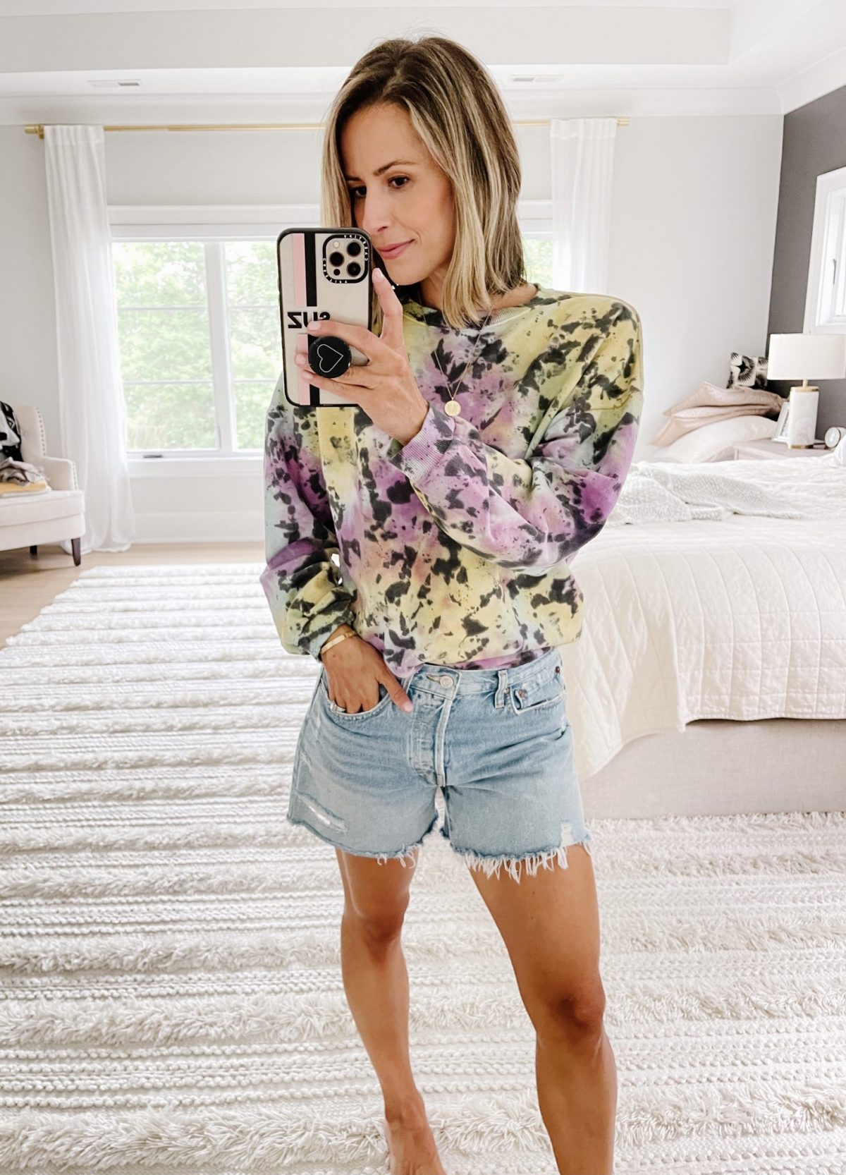 Summer to fall style: tie dye sweatshirt and cut offs