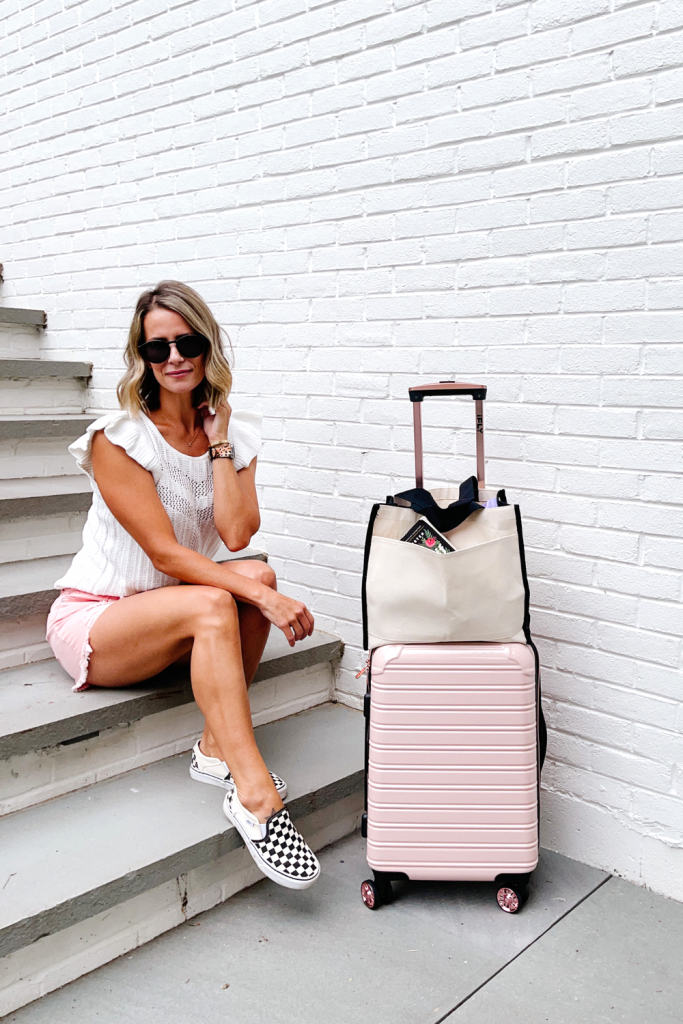 Walmart Travel Favorites: rose gold suitcase and canvas bag

White lace tank, pink shorts, Vans sneakers