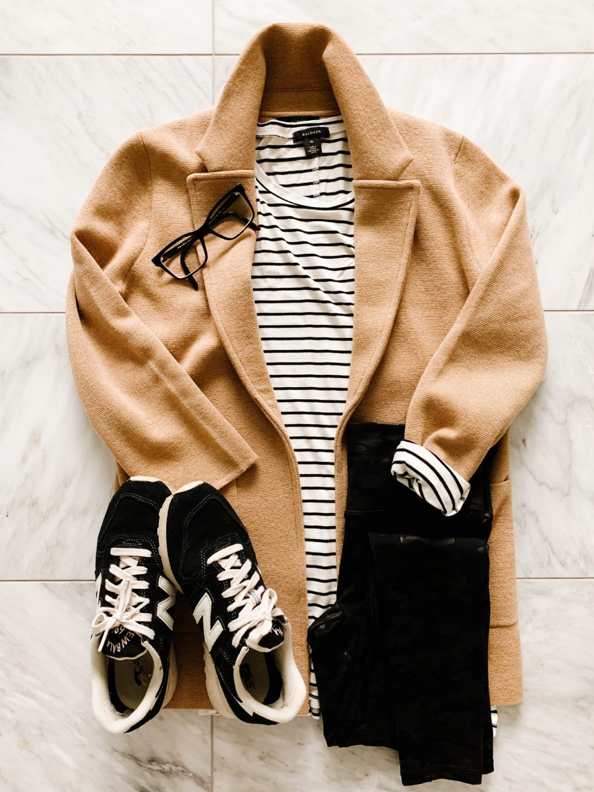 A J. Crew sweater blazer, striped tee, black pants and New Balance sneakers