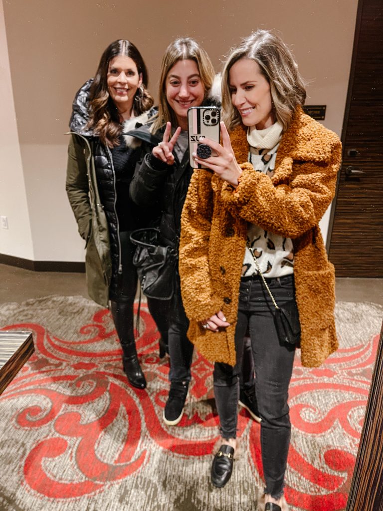 My first sober girls' trip. Suzanne and her friends taking a mirror selfie 