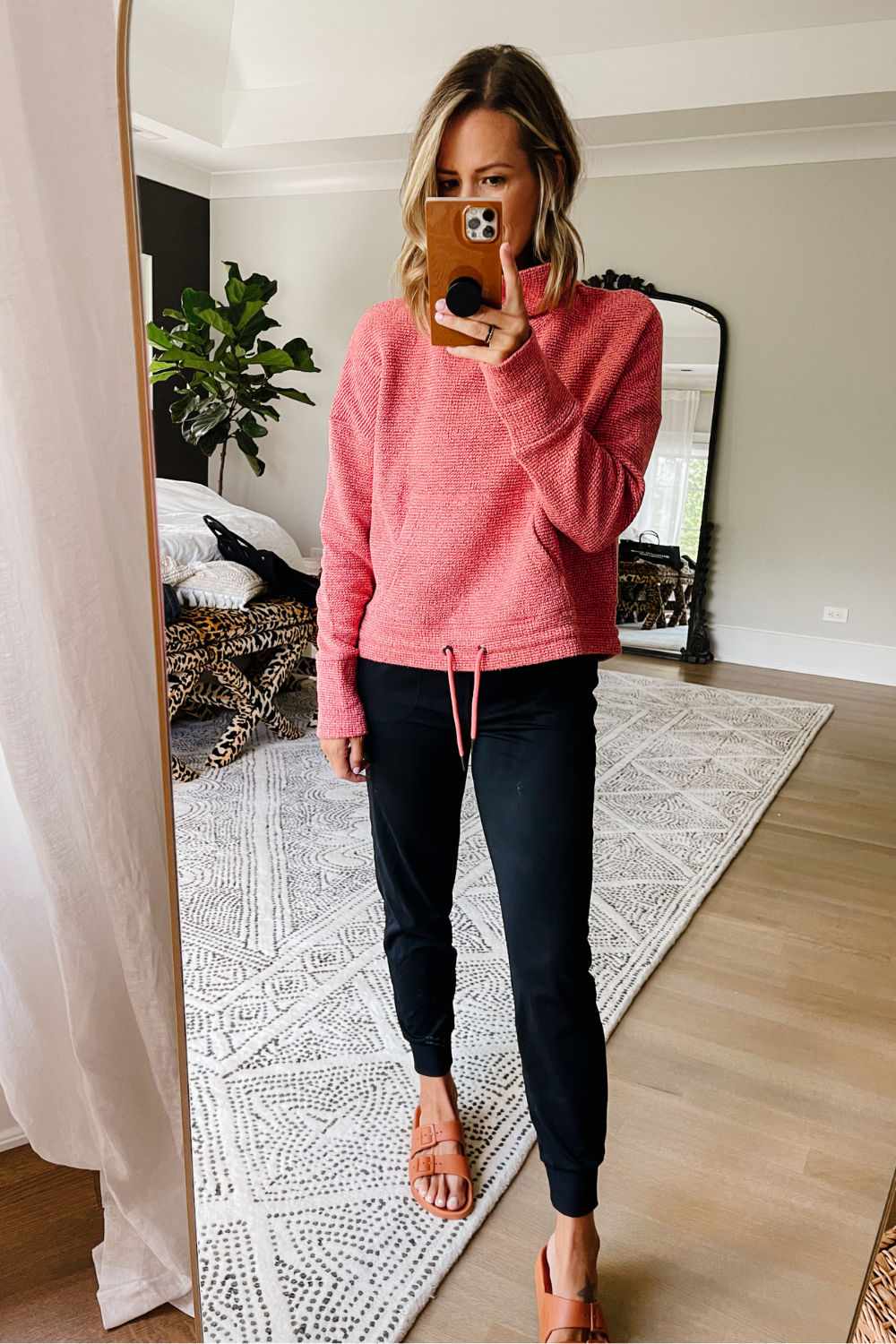 Suzanne wearing a Sweaty Betty pullover and joggers