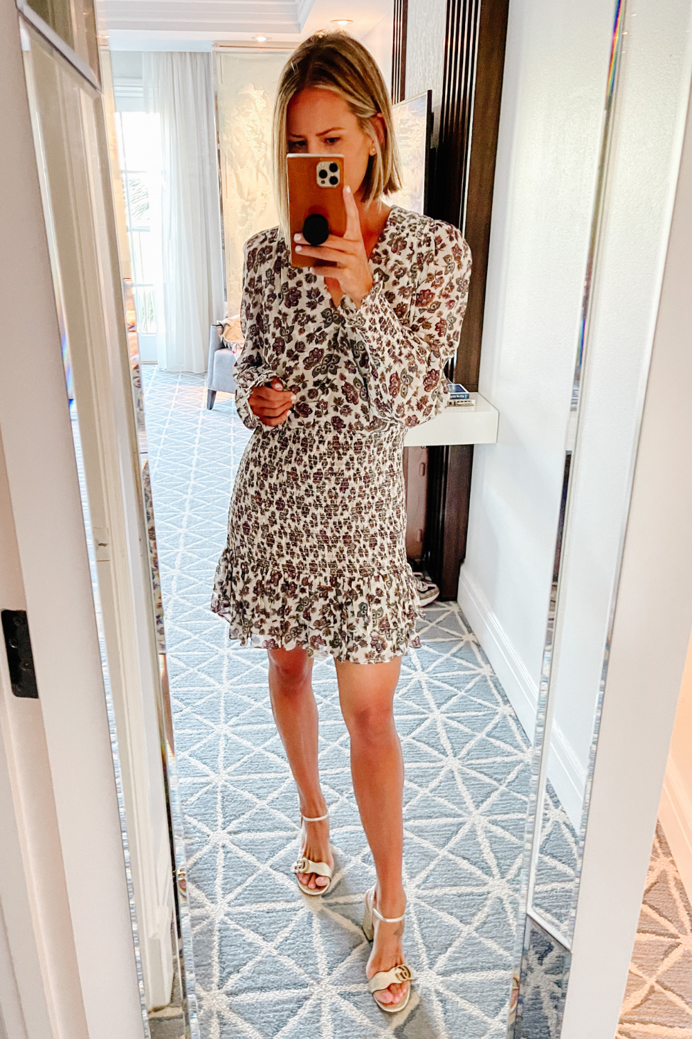 Suzanne in a Veronica Beard mini dress and heels 