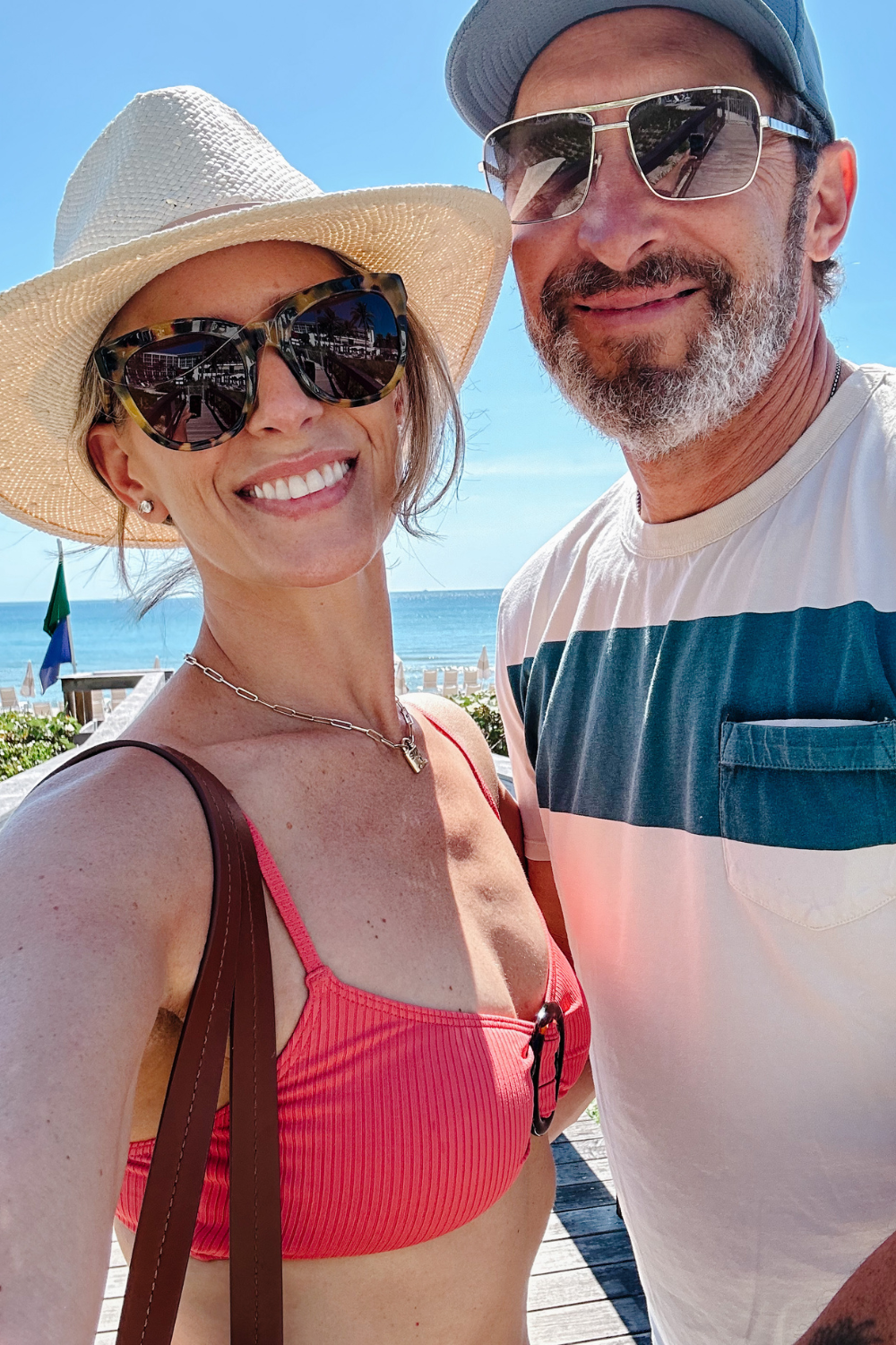 Suzanne and her husband on a beach vacation